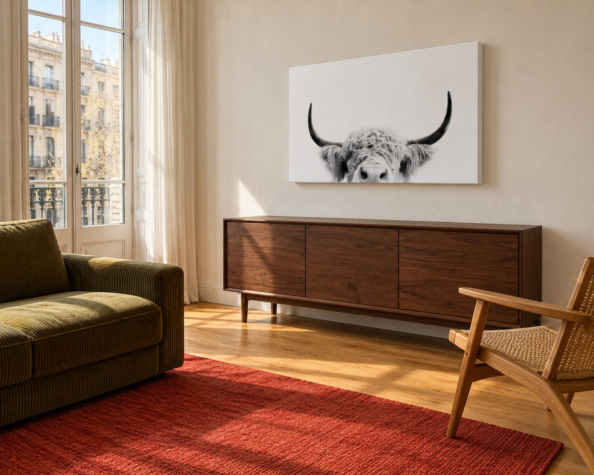 Peeking cow BW - Unframed canvas in an interior