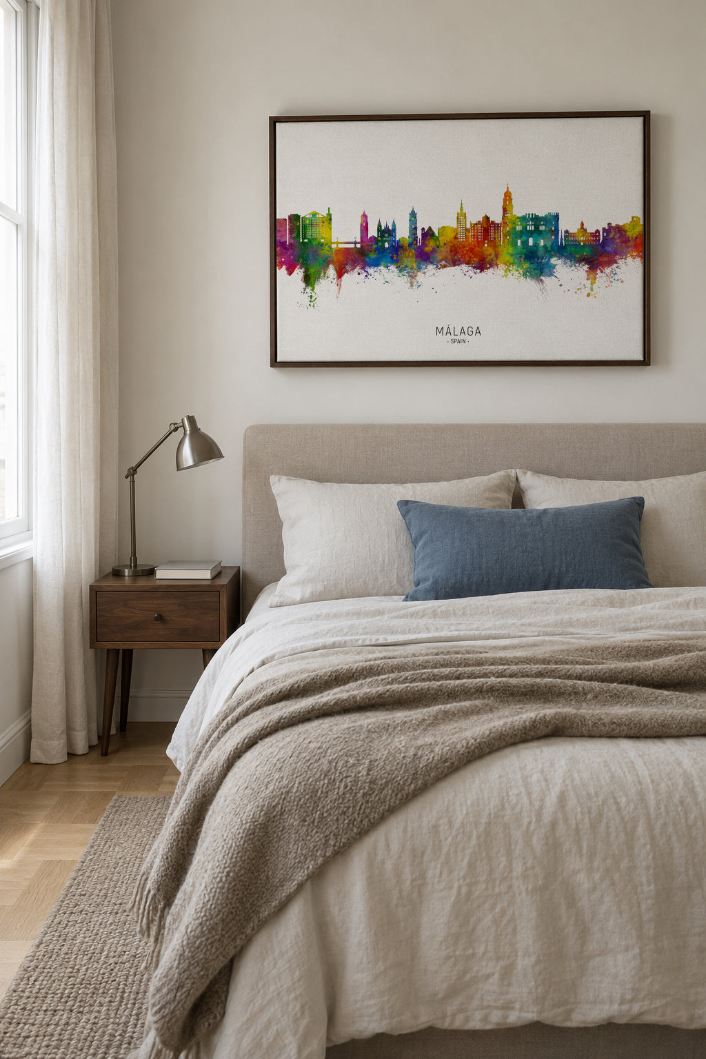 Málaga Skyline multicolor - Framed canvas in an interior