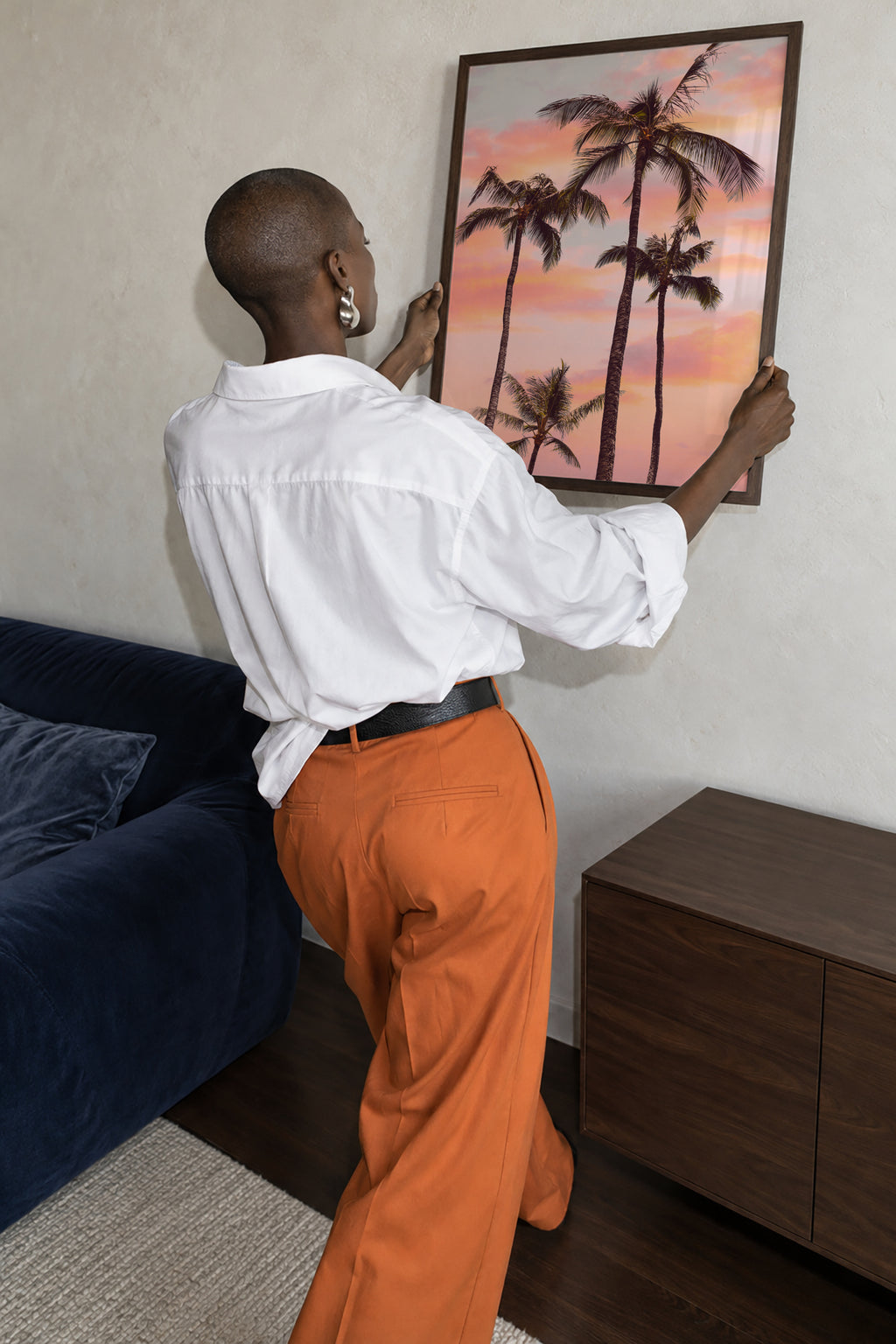 Sunset Palm Trees - Framed poster in an interior