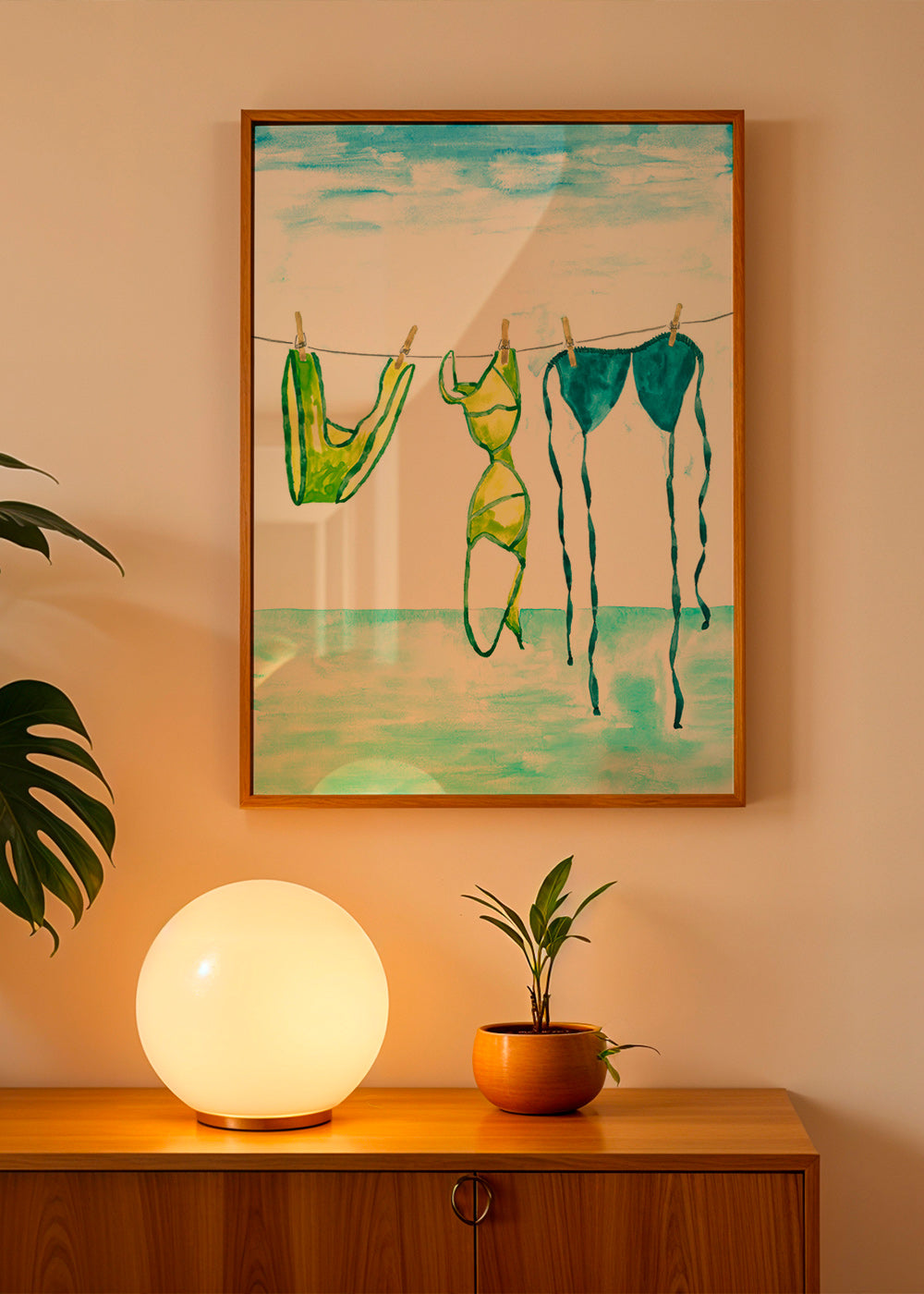 Ilustración de bikinis colgados en la playa – Product1