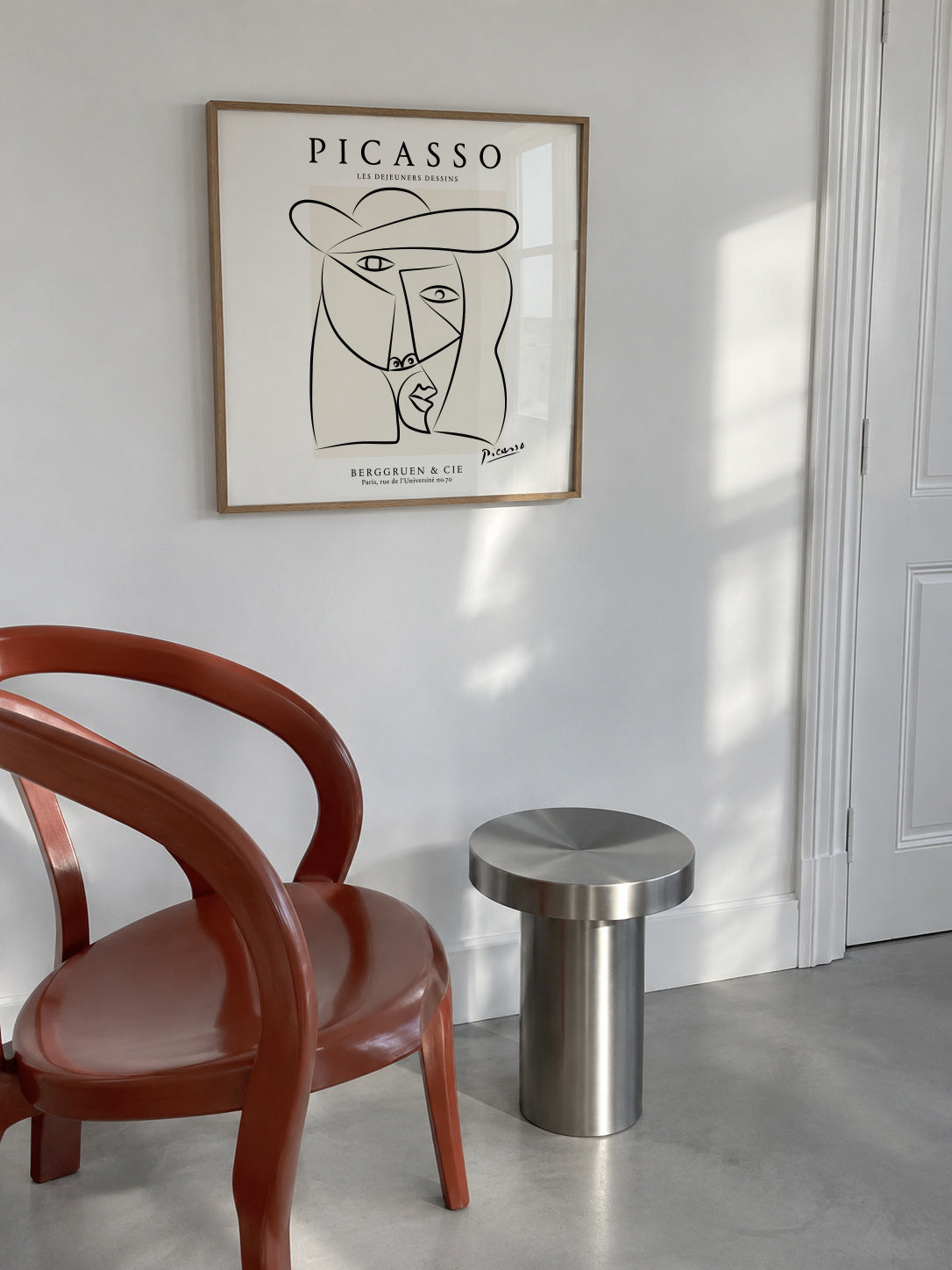 Picasso Woman in a Hat Sktech Poster - Square - Framed poster in an interior