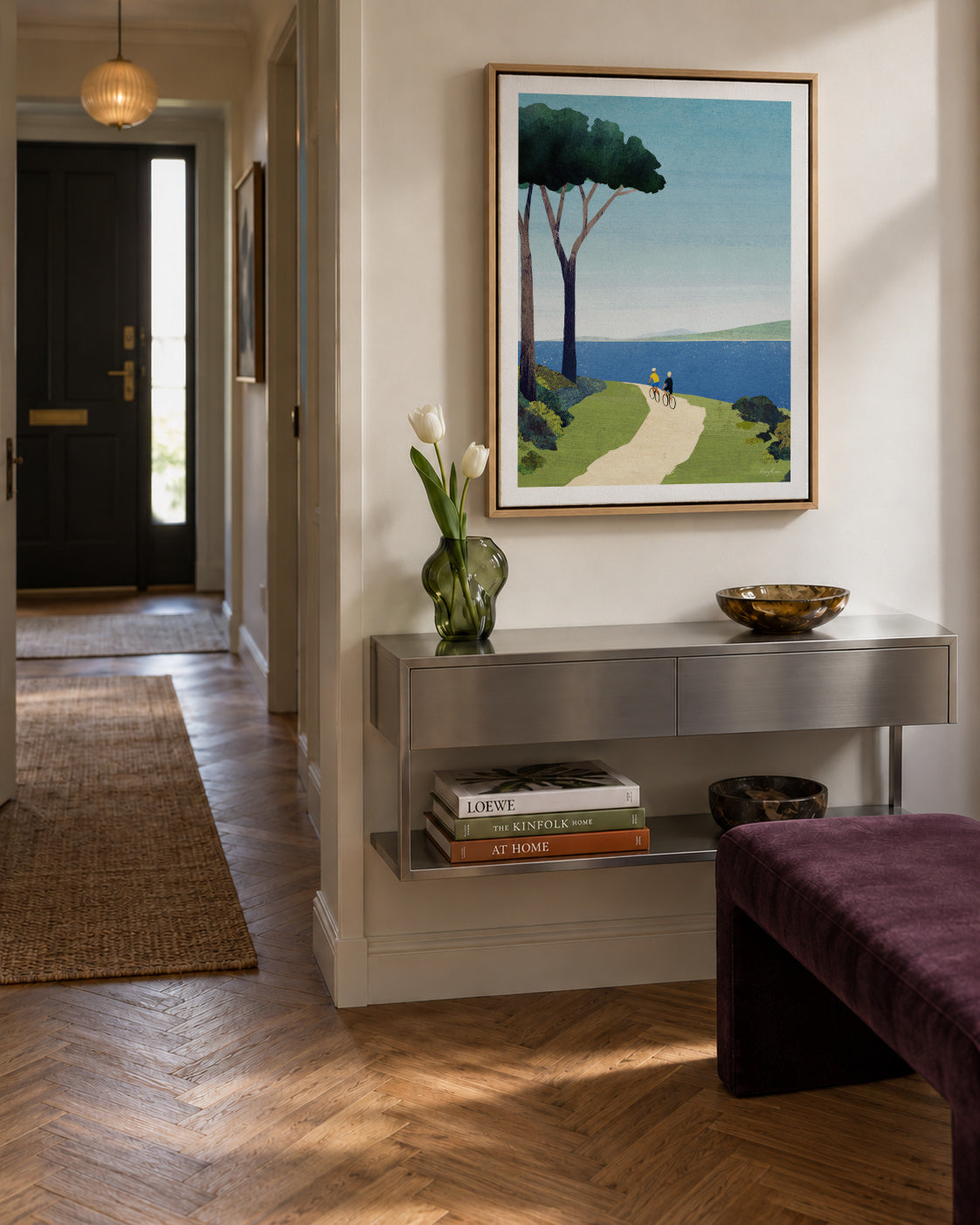 Cycling by the sea - Framed canvas in an interior