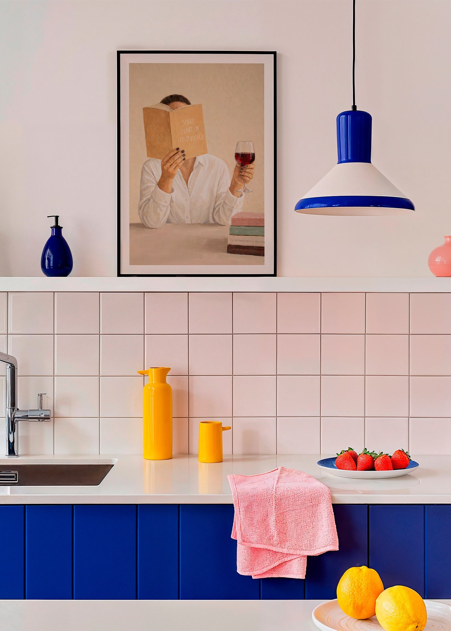Kitchen art: woman reading with a glass of wine