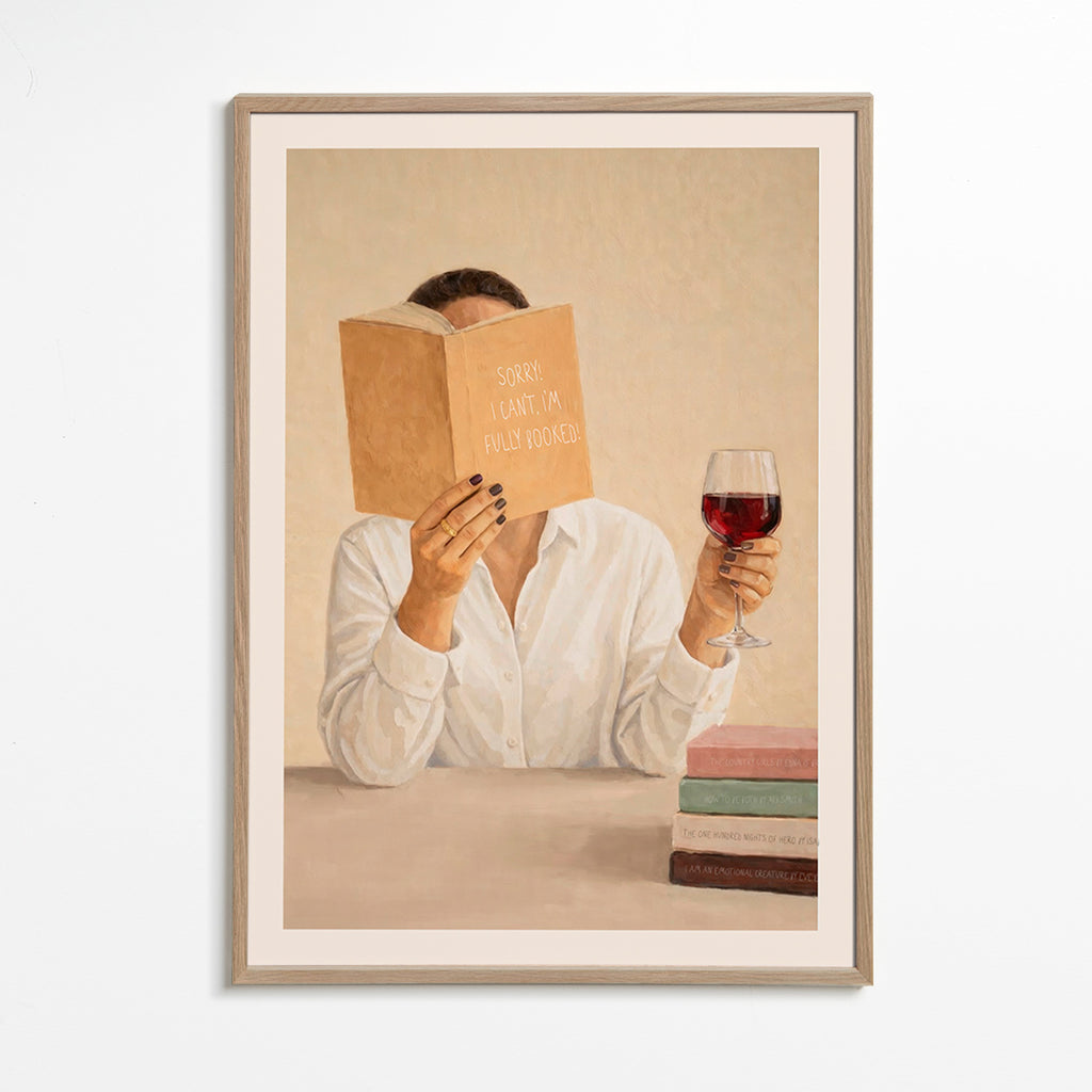 Kitchen art: woman reading with a glass of wine