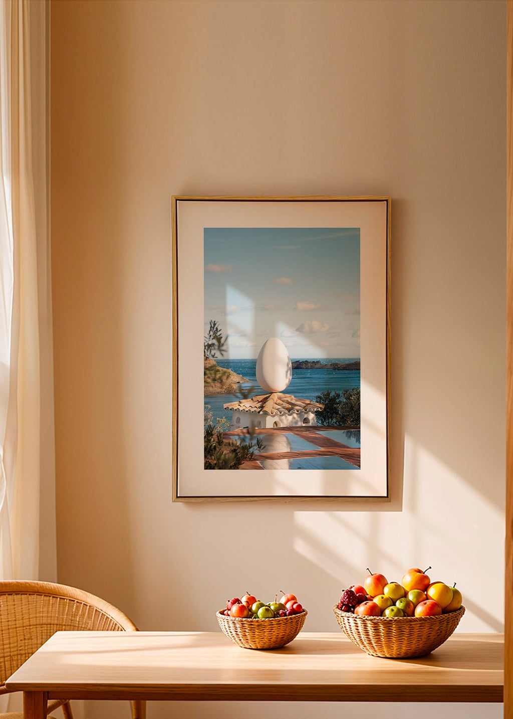 Landscape art with sculptural egg by the sea