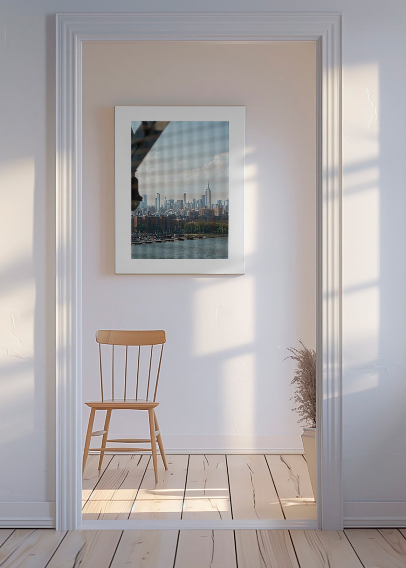 City print showing skyline through a window