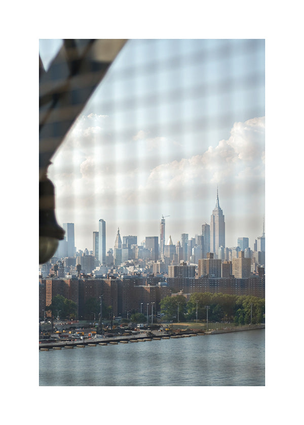 City print showing skyline through a window