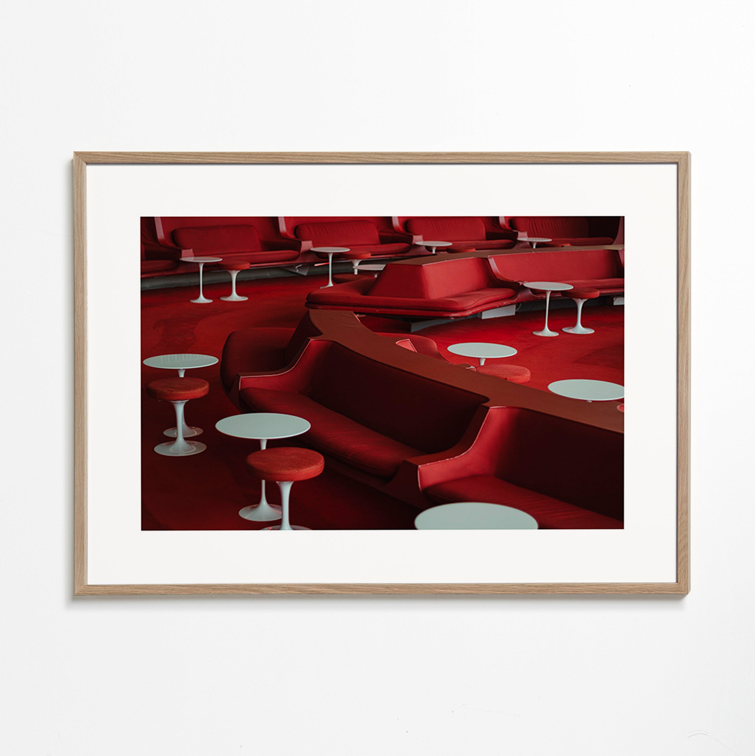 Red lounge photograph with curved seating