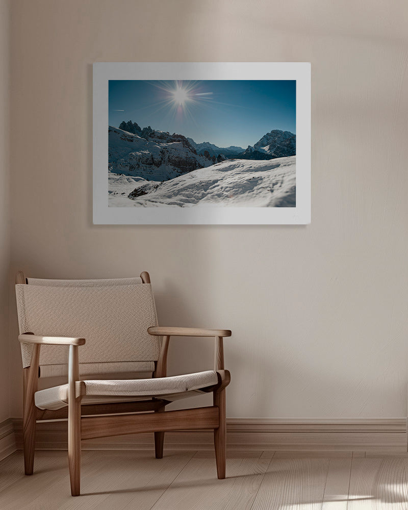 Landscape art: snowy mountain range under bright sun