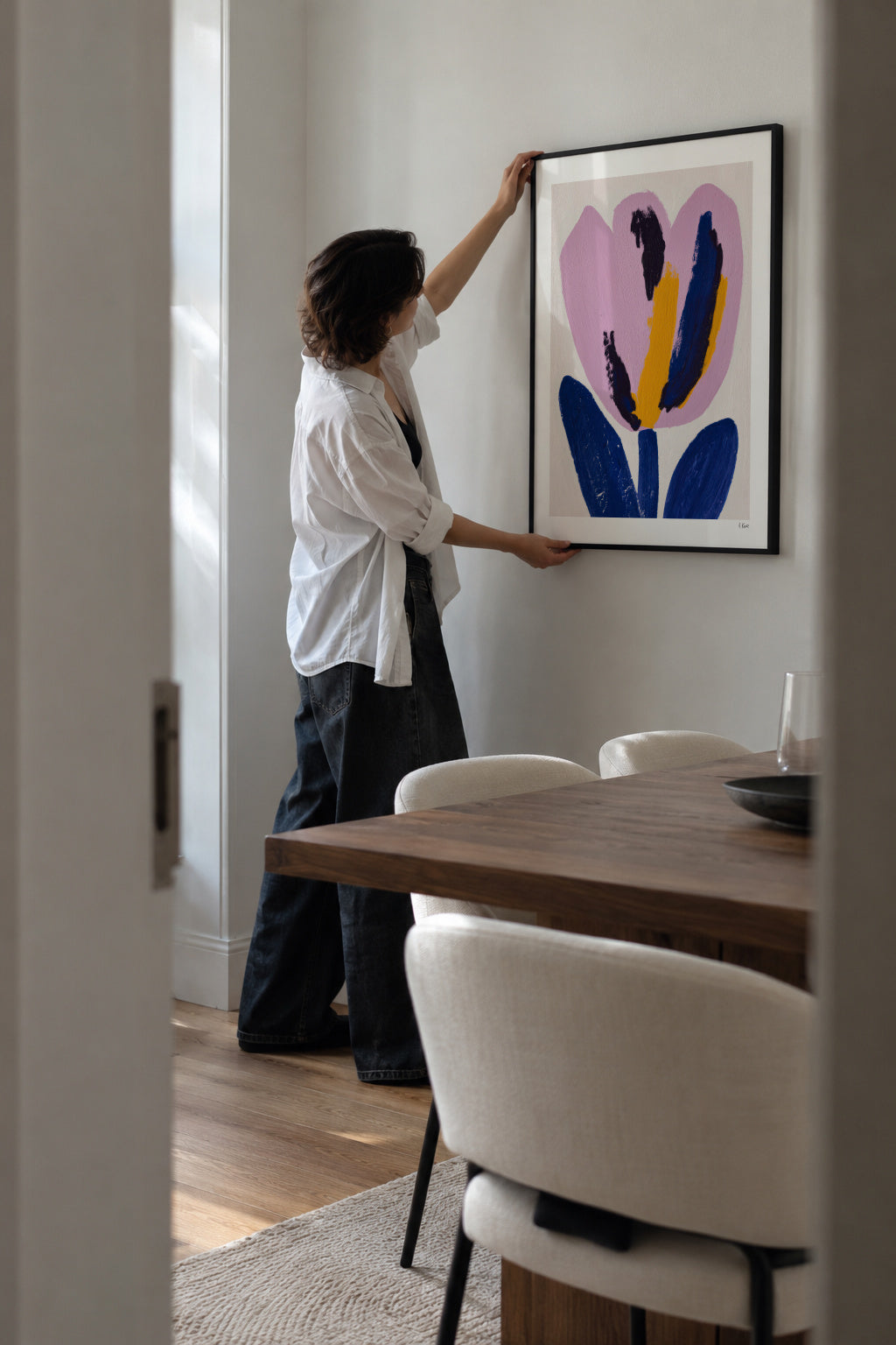 Pink Petal - Framed poster in an interior