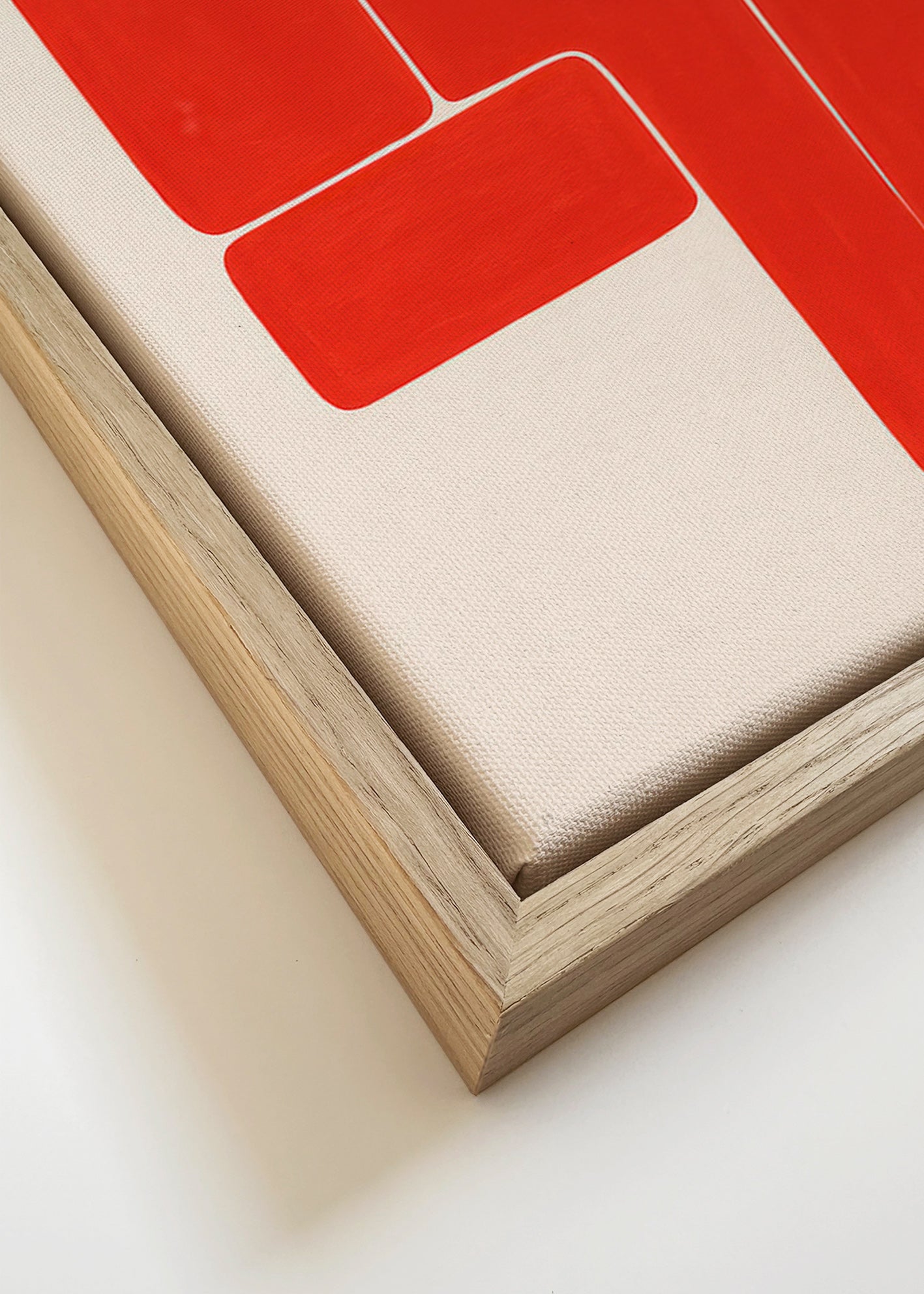 Cuadro geométrico con formas L rojas – Canvas detail