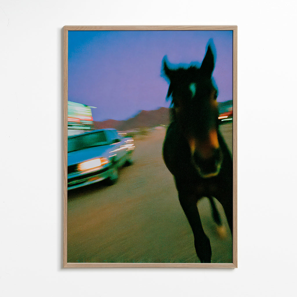 Artwork horse in motion at dusk