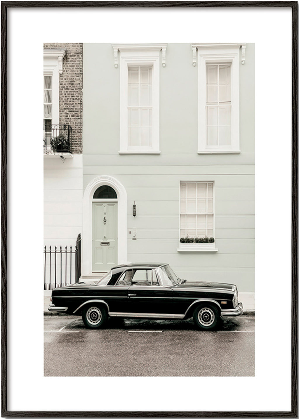 Vintage print classic car by a city facade