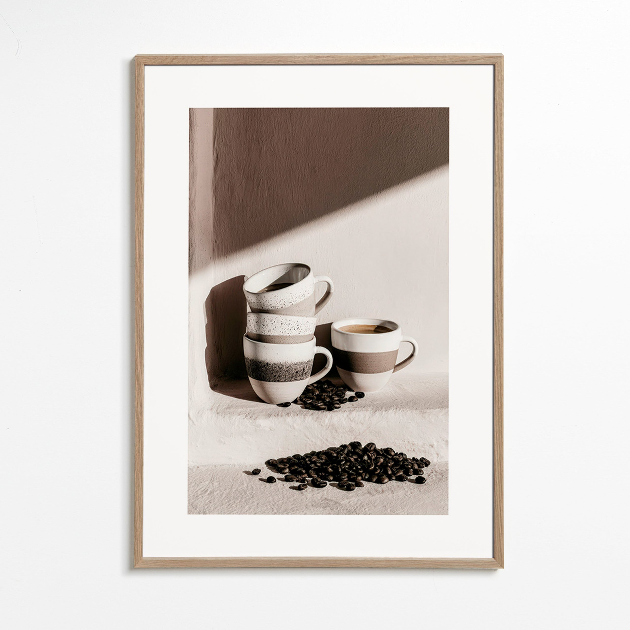 Kitchen art: stacked mugs with coffee beans