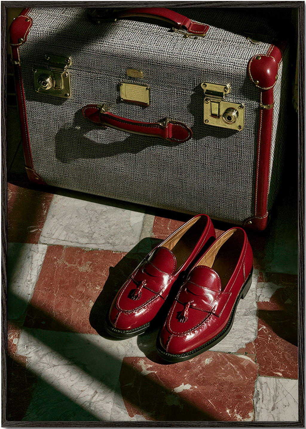Travel photograph with vintage suitcase and red loafers