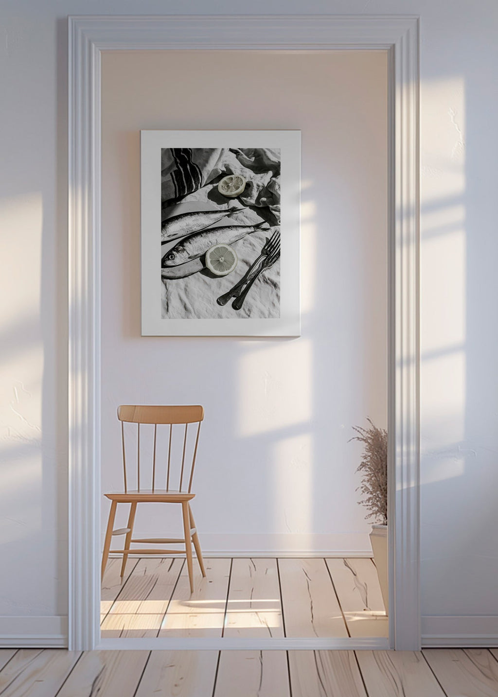 Kitchen art: monochrome sardines and lemon still life