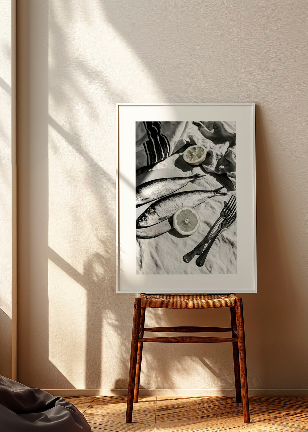 Kitchen art: monochrome sardines and lemon still life