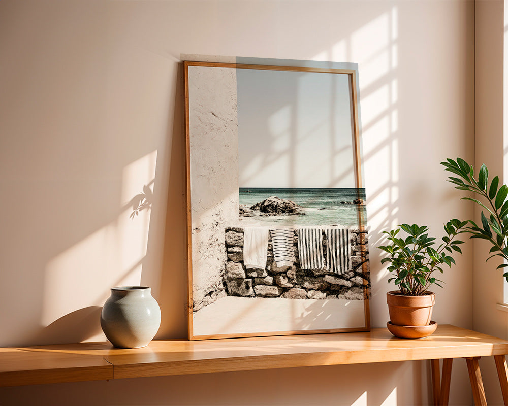 Coastal landscape photograph with hanging towels